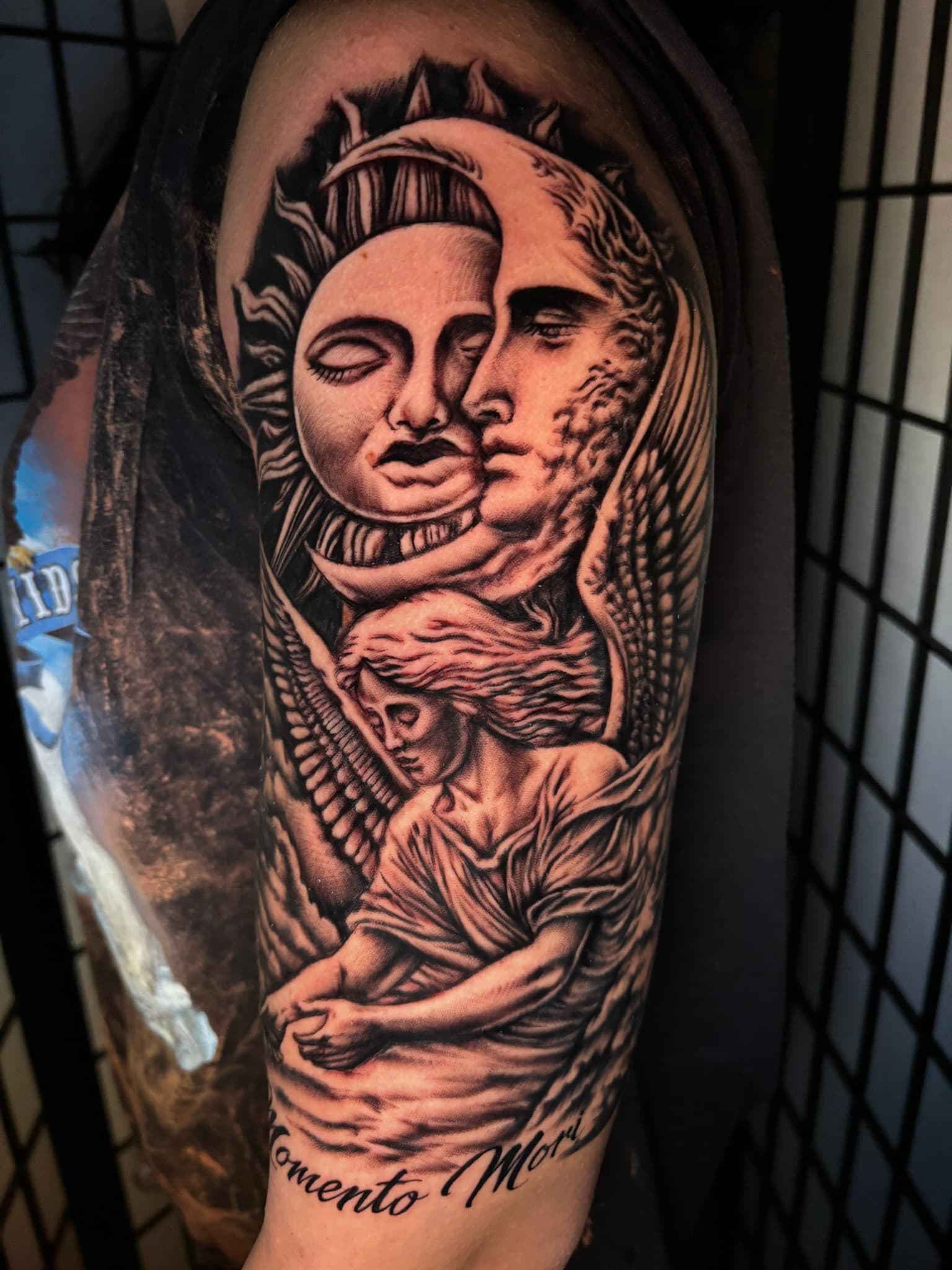 Custom angel with sun and moon tattoo by Isaac Mackenzie, Oahu