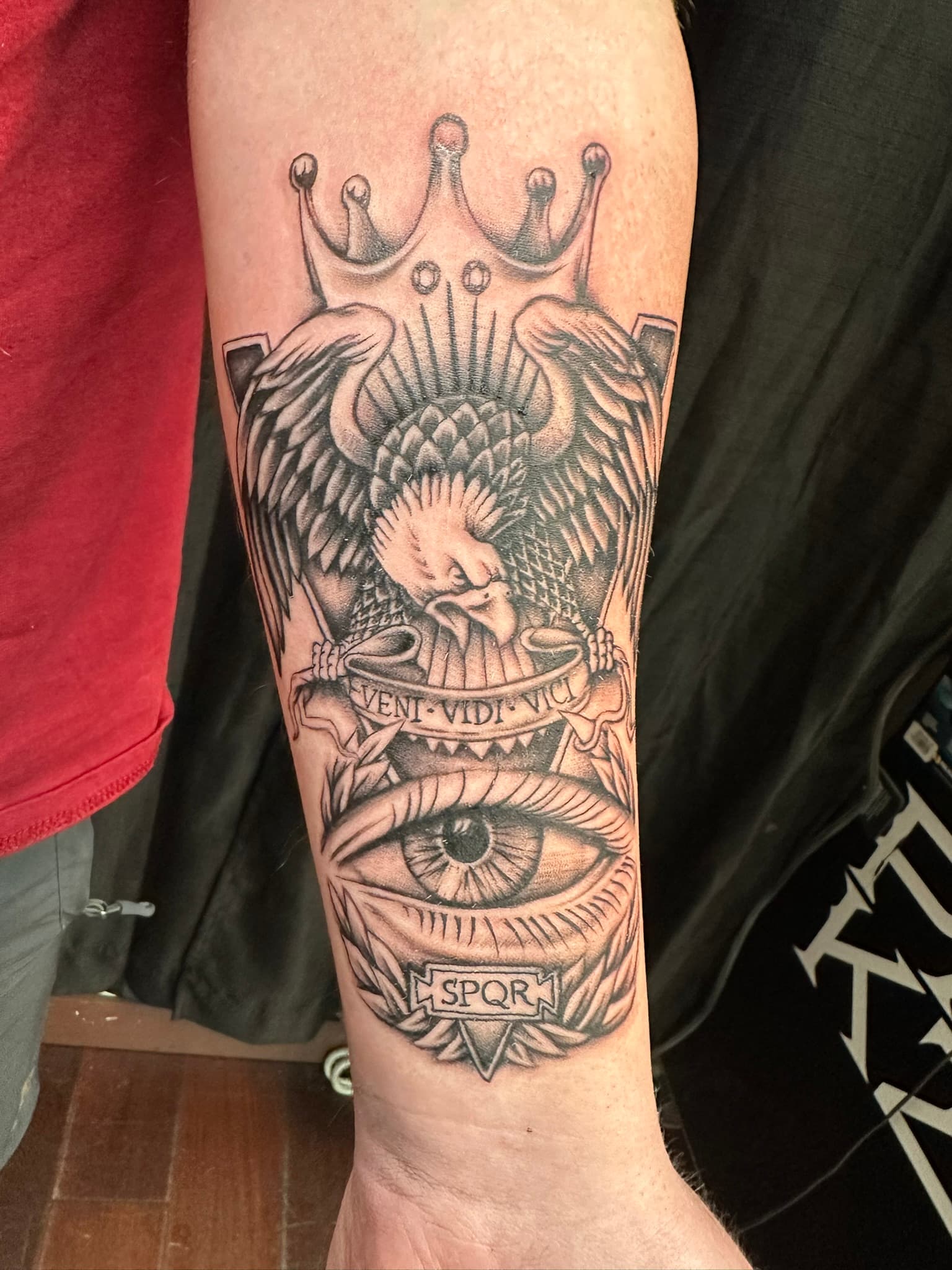 Custom eagle, eye, and crown tattoo by Isaac Mackenzie, Hawaii