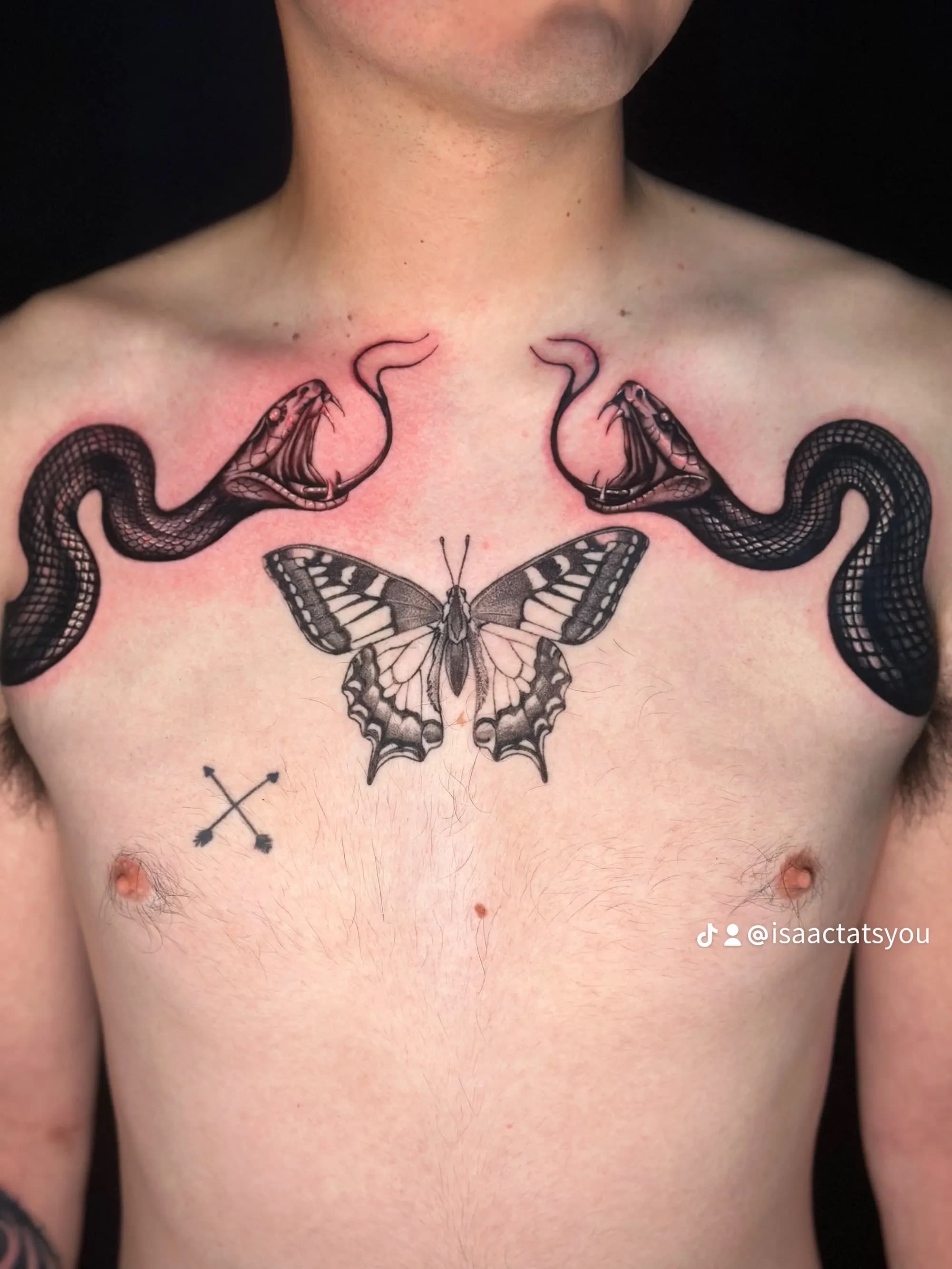 Custom duality snakes tattoo by Isaac Mackenzie at TNT Tattoo, Aiea, Oahu
