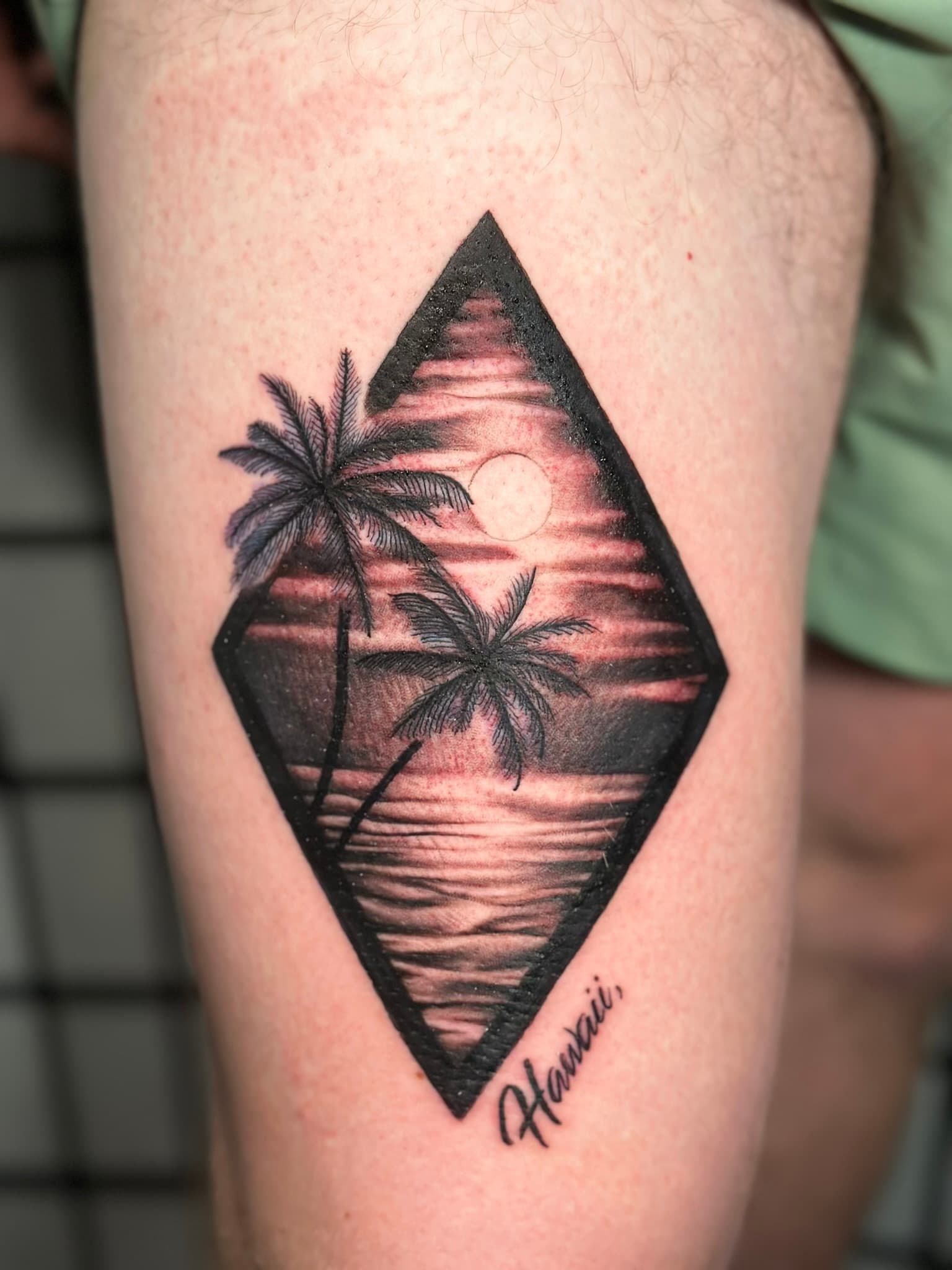 Custom tropical island night scene tattoo by Isaac Mackenzie, Oahu Hawaii