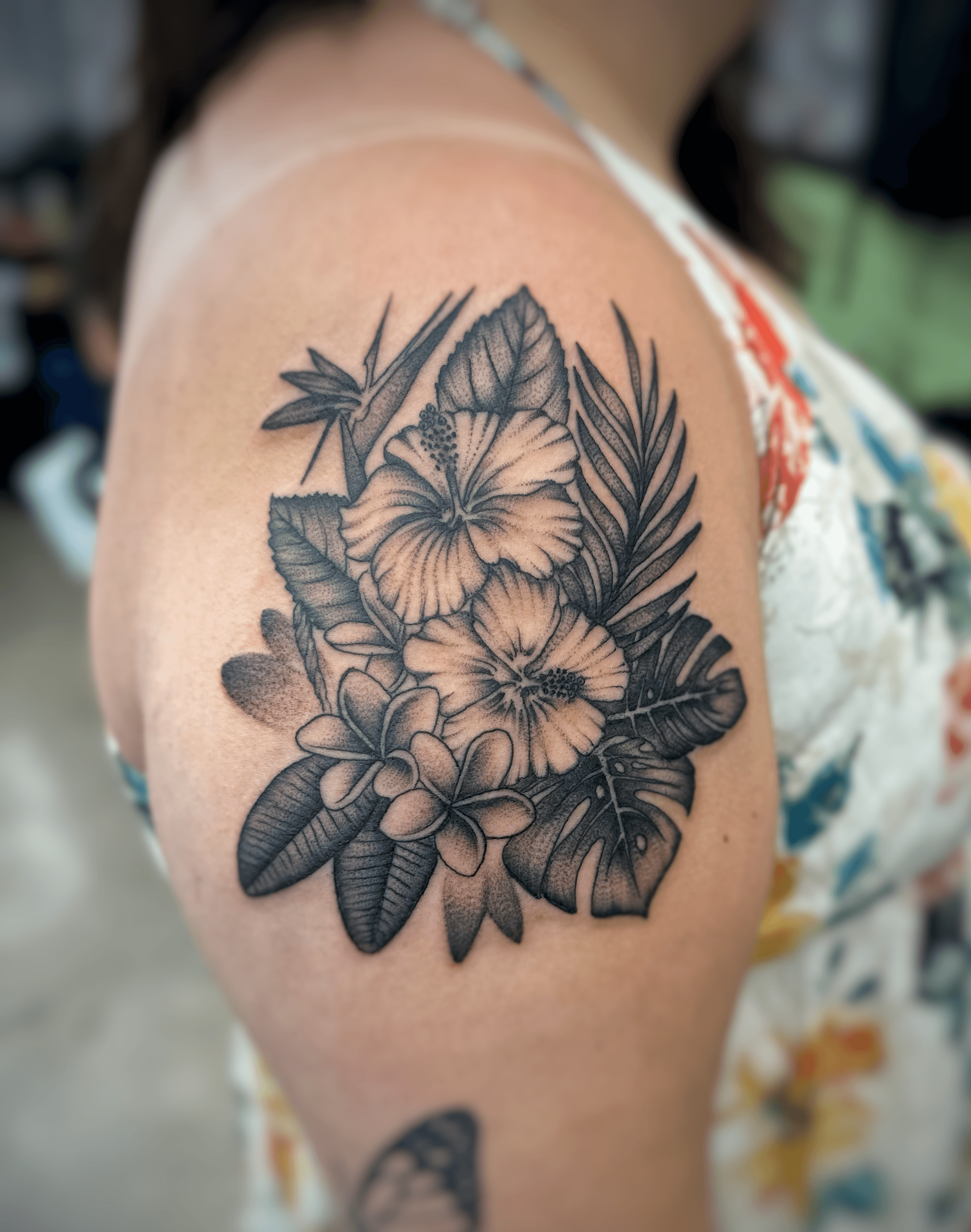 Fine line Hawaiian florals tattoo by Isaac Mackenzie, Hawaii
