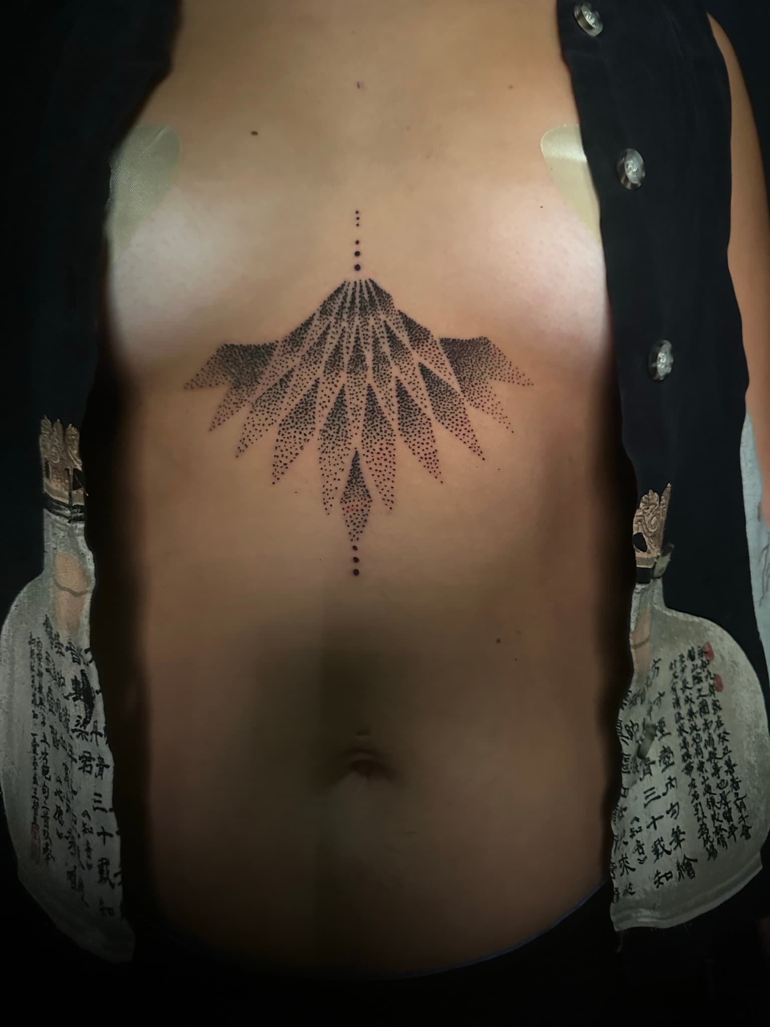 Chandelier mandala underboob tattoo by Isaac Mackenzie, Hawaii