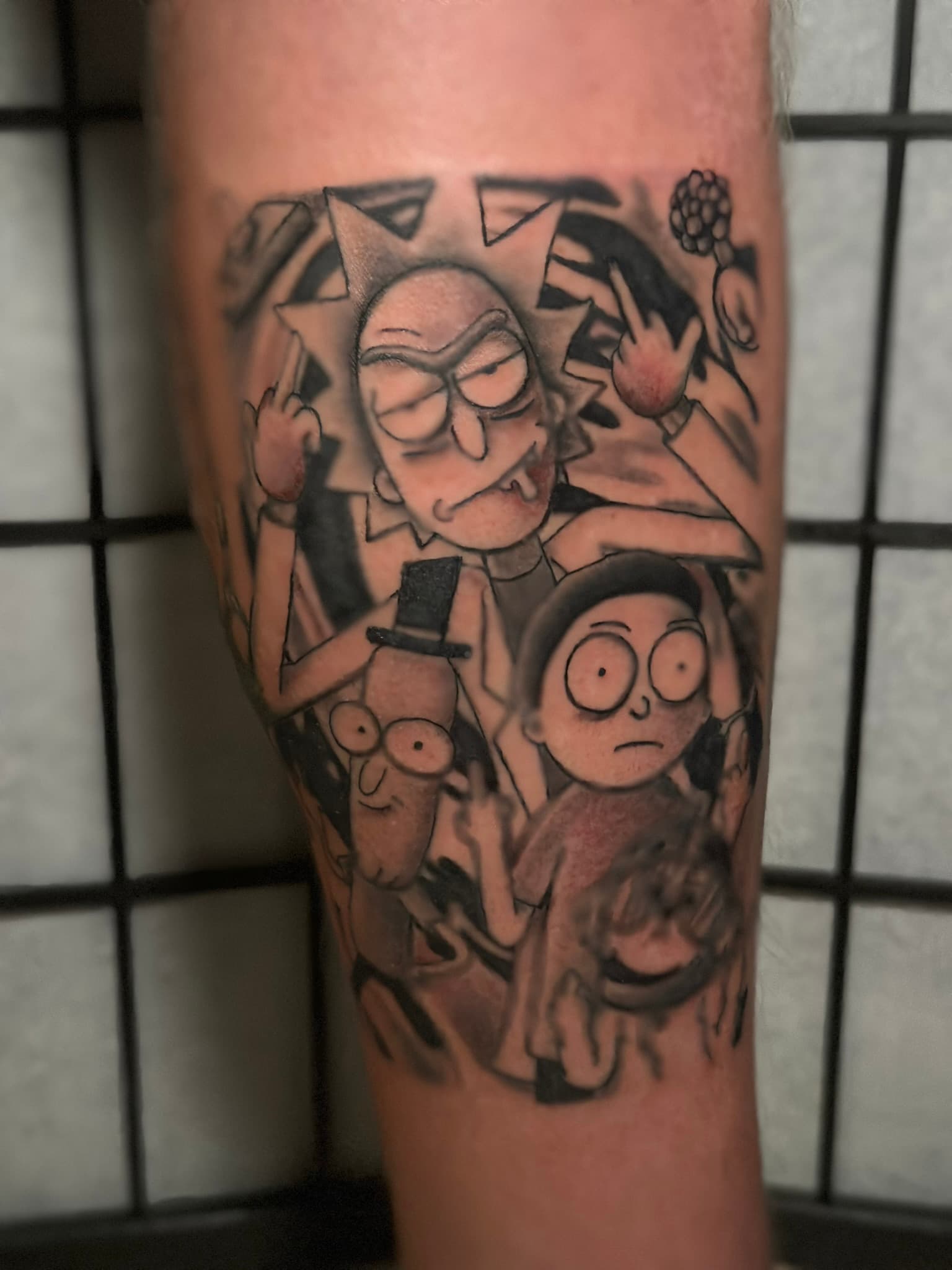Rick and Morty inspired illustrative tattoo by Isaac Mackenzie