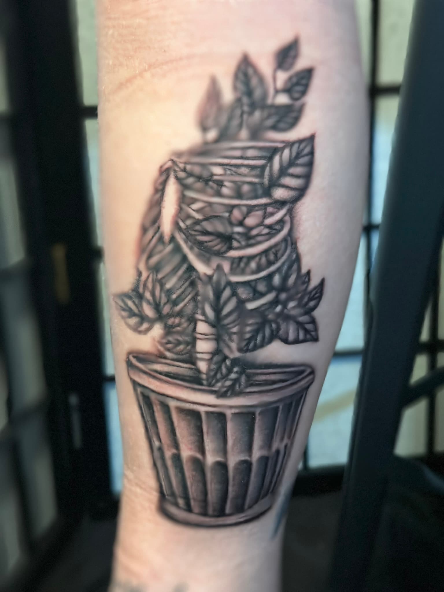 Illustrative plant chest tattoo by Isaac Mackenzie
