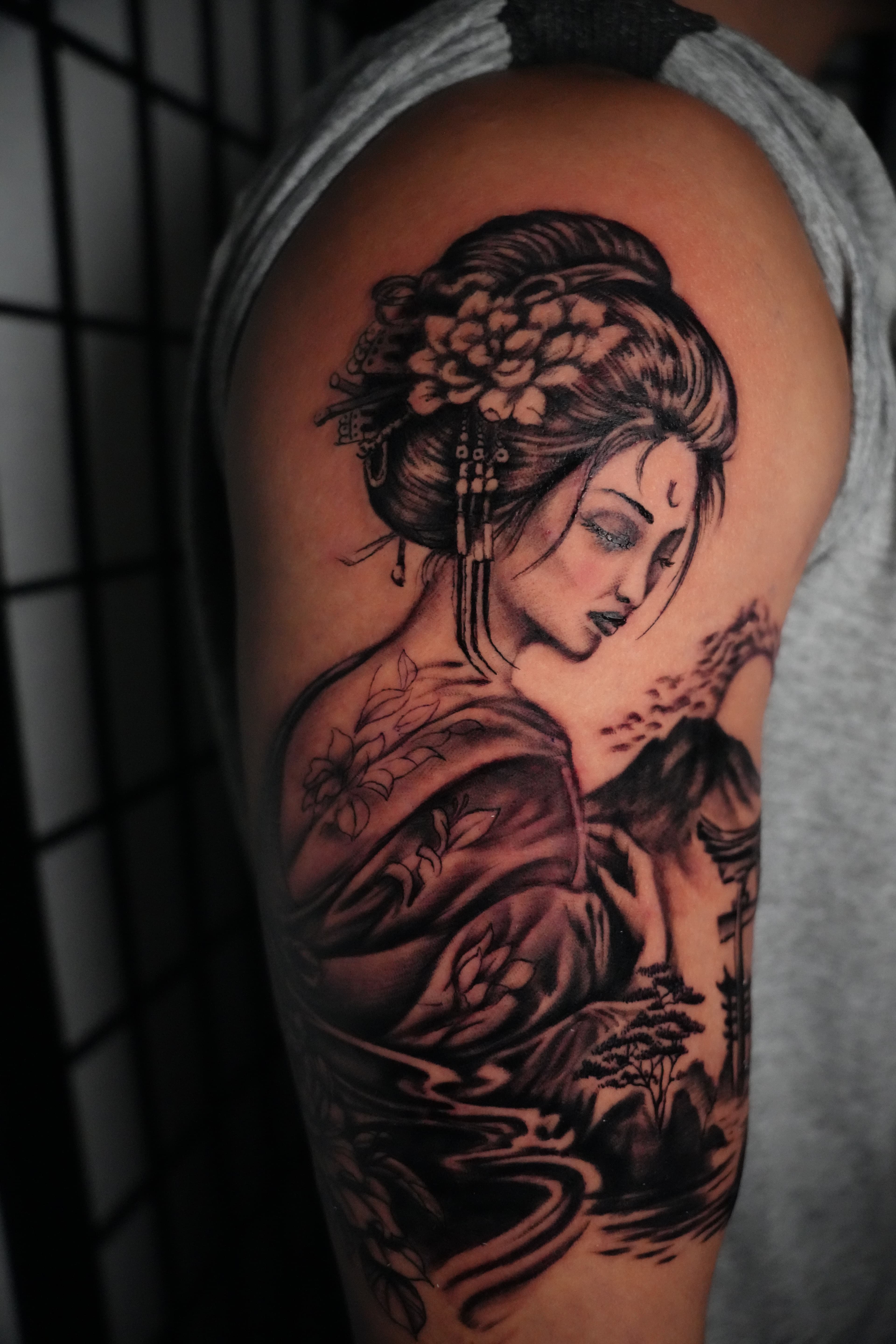 Japanese realism geisha with Mount Fuji tattoo by Isaac Mackenzie, Oahu