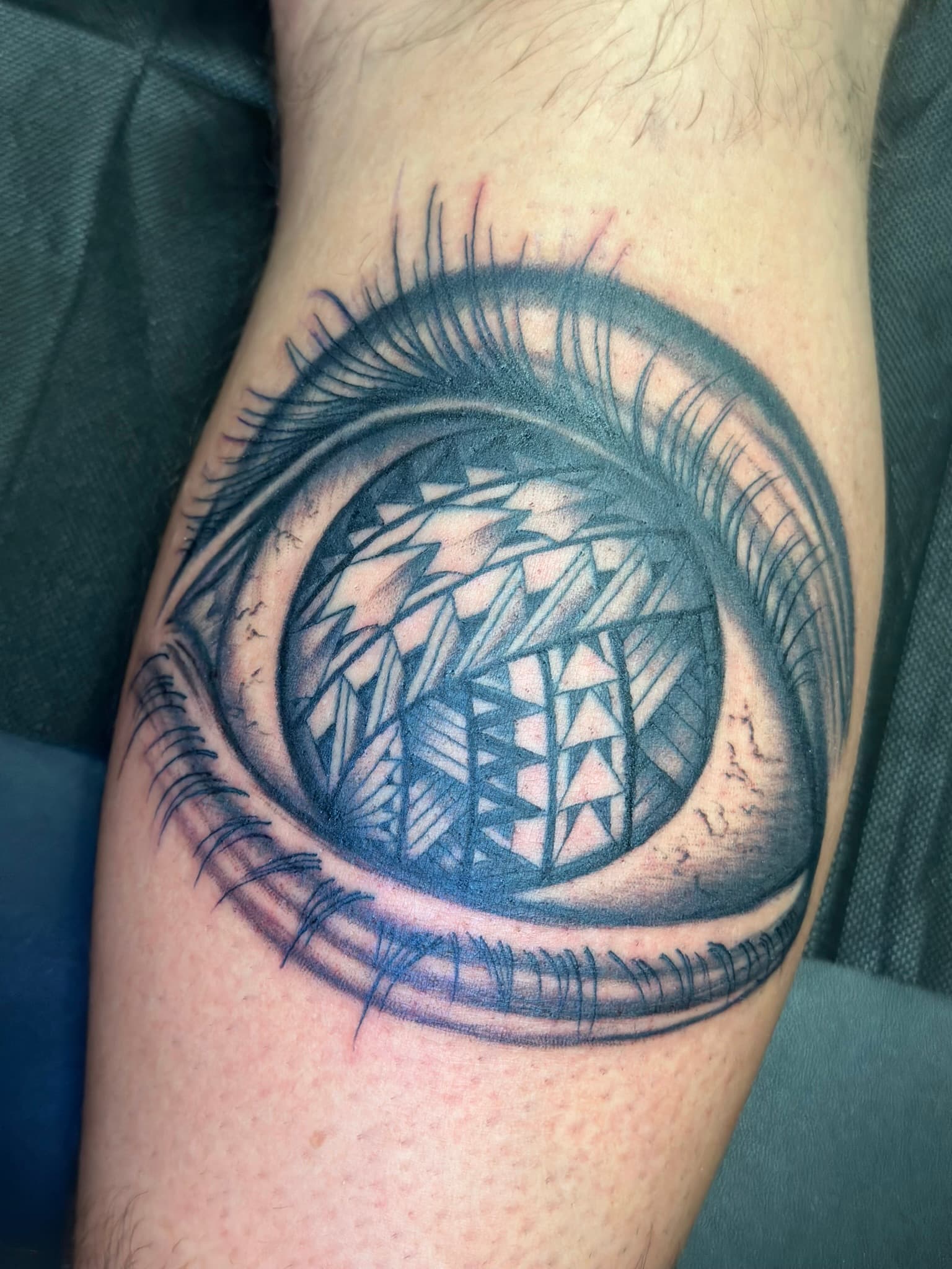 Custom Polynesian tribal eye tattoo by Isaac Mackenzie, Oahu