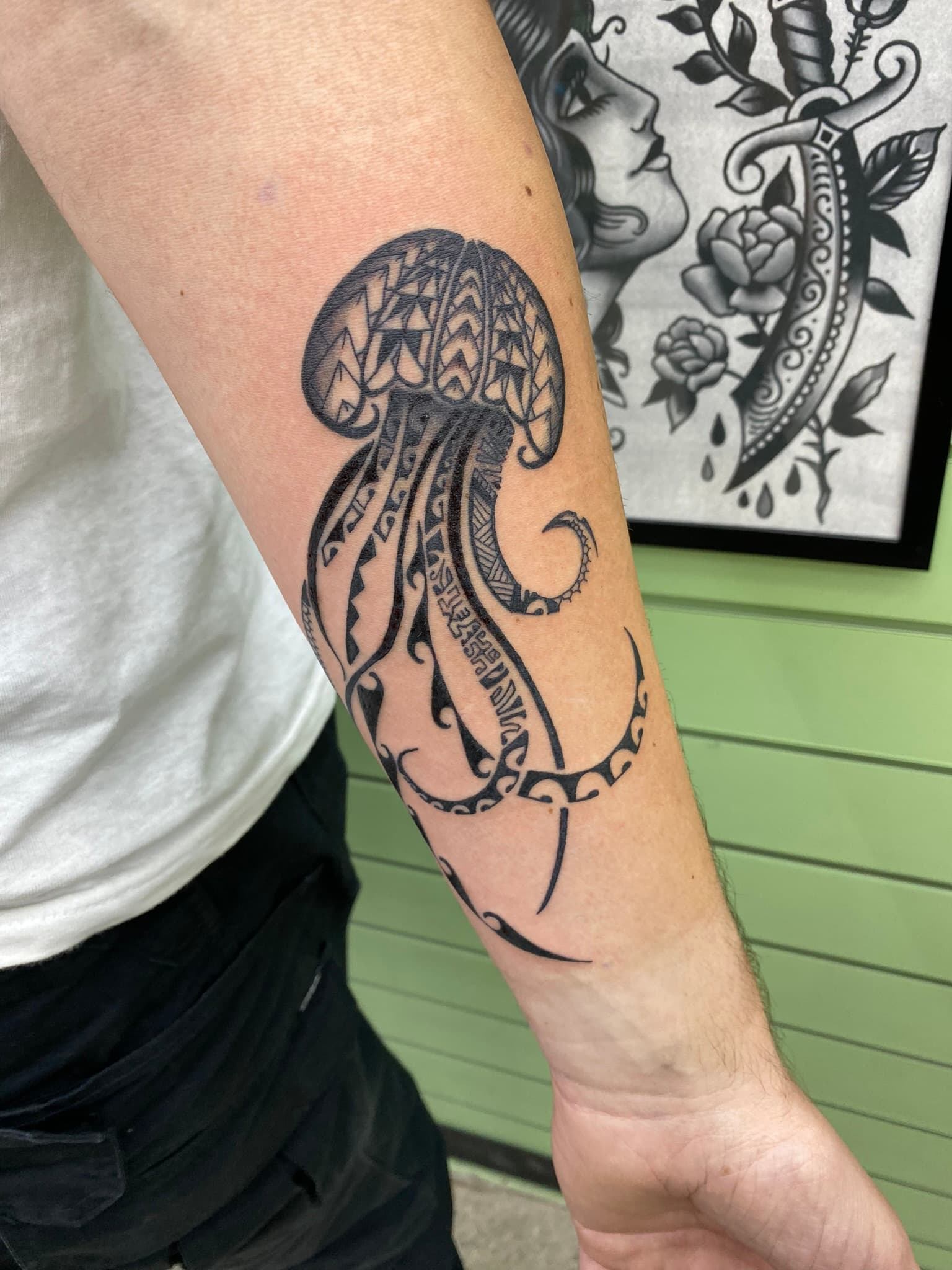 Custom Polynesian tribal jellyfish tattoo by Isaac Mackenzie, Oahu