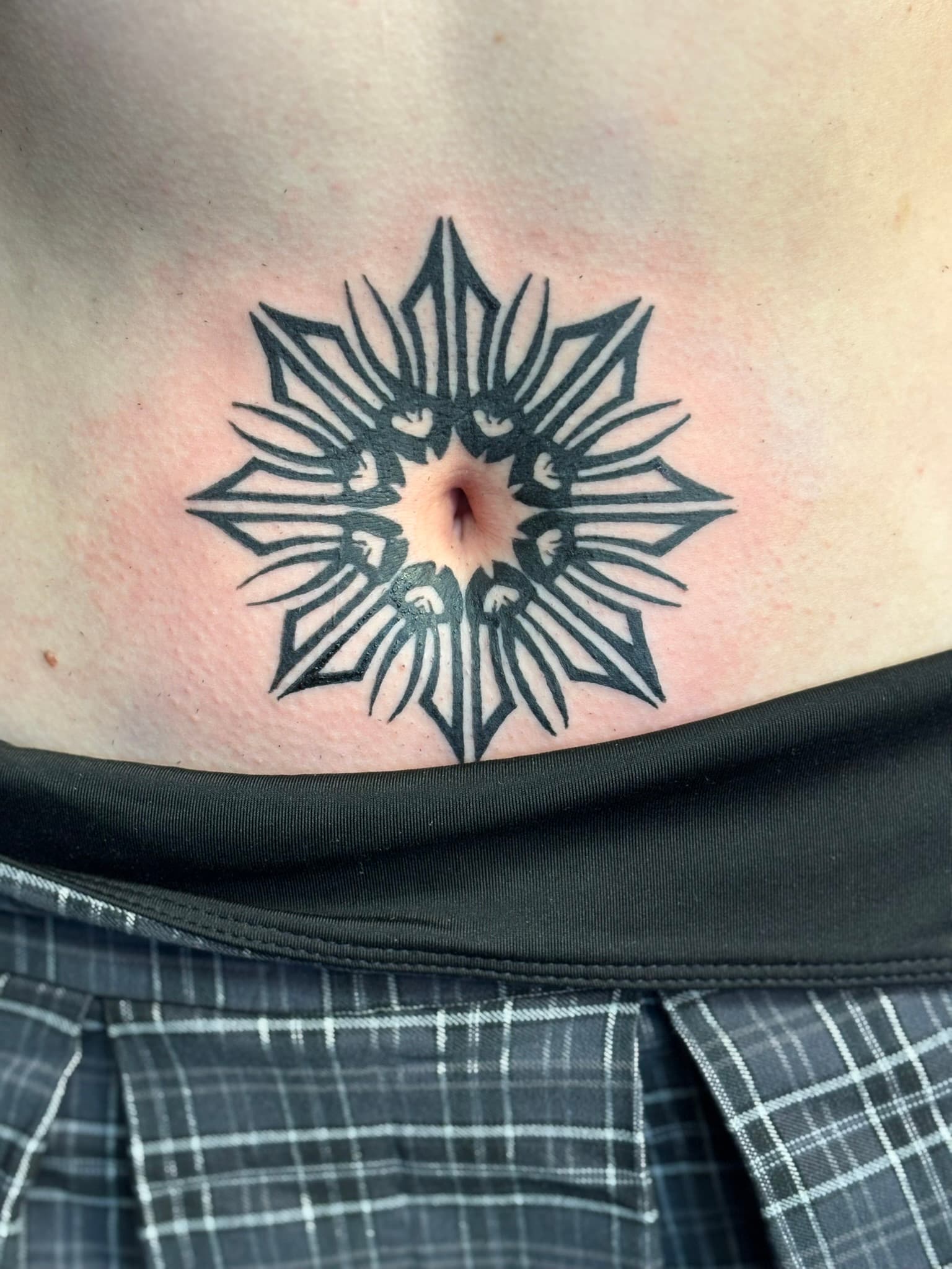 Polynesian radial tribal tattoo by Isaac Mackenzie, Oahu