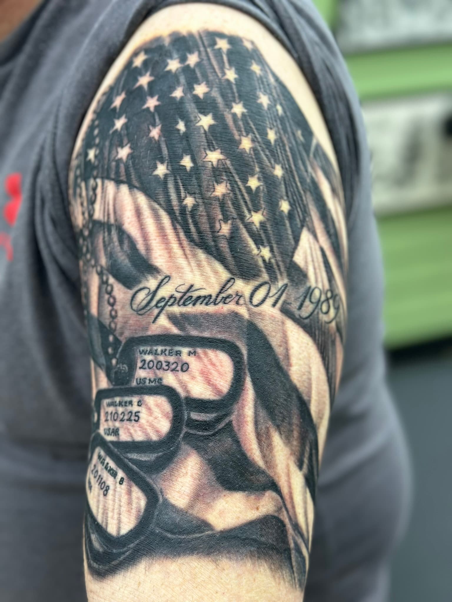 Realism American flag and military dog tags tattoo