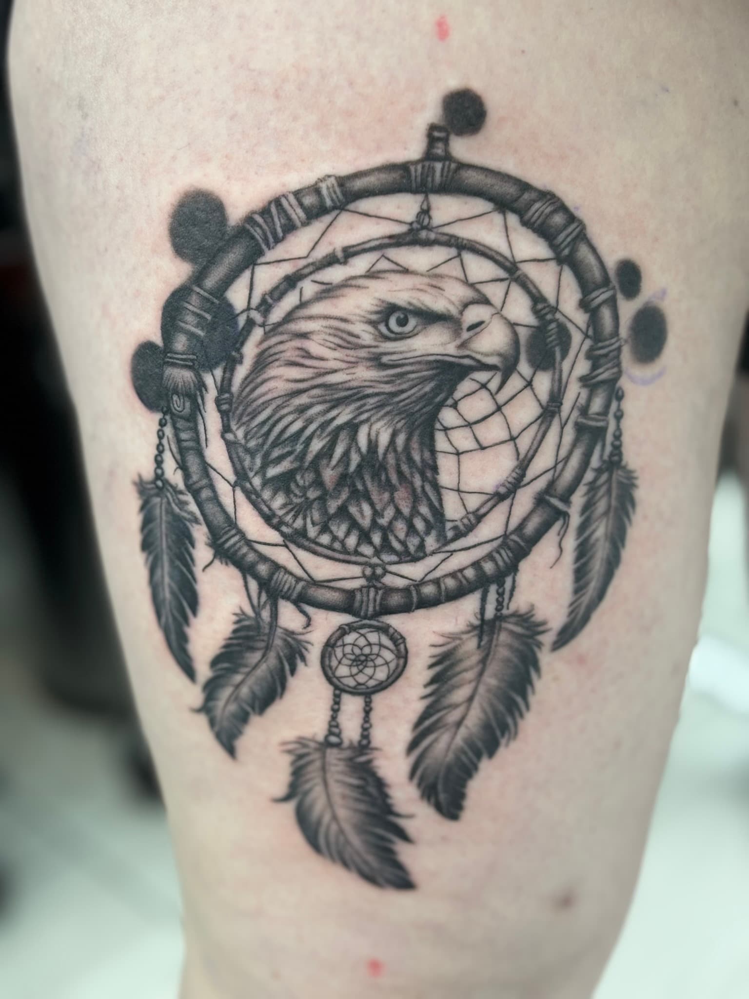 Realism eagle and dreamcatcher tattoo by Isaac Mackenzie