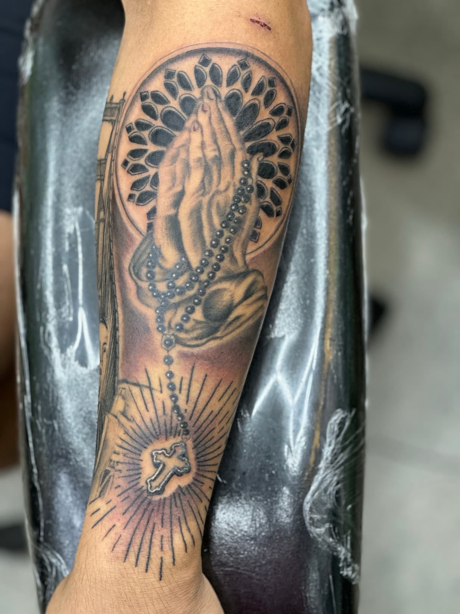 Realism praying hands with rosary tattoo, Hawaii