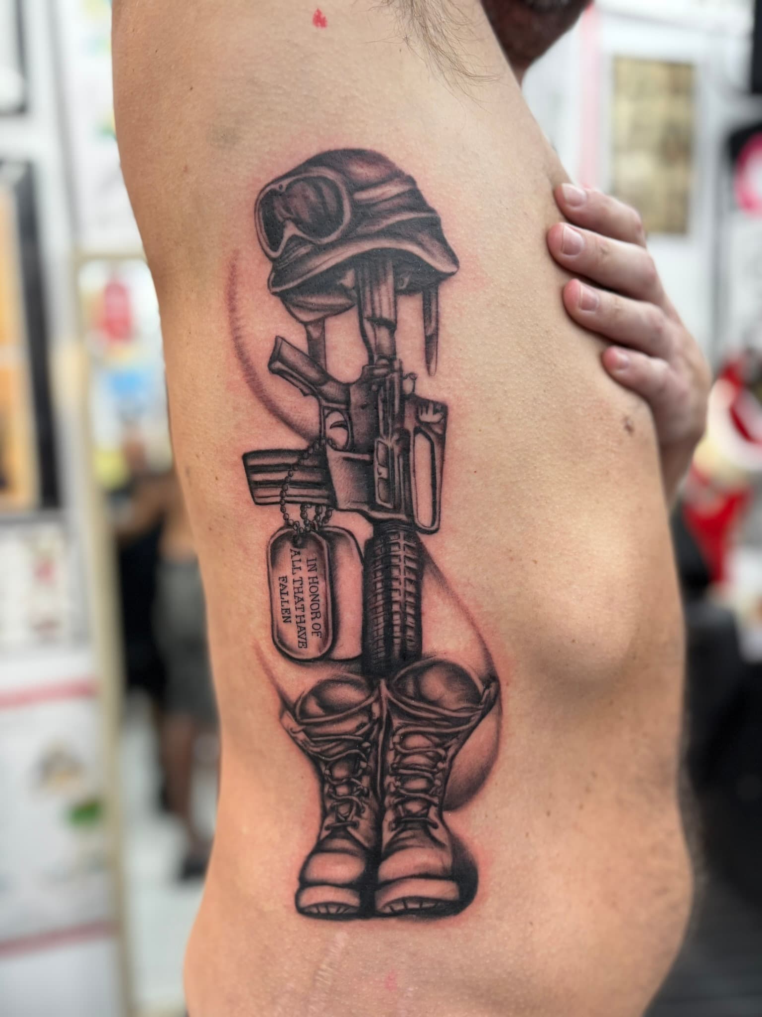 Realism soldier's memorial tattoo by Isaac Mackenzie, Oahu
