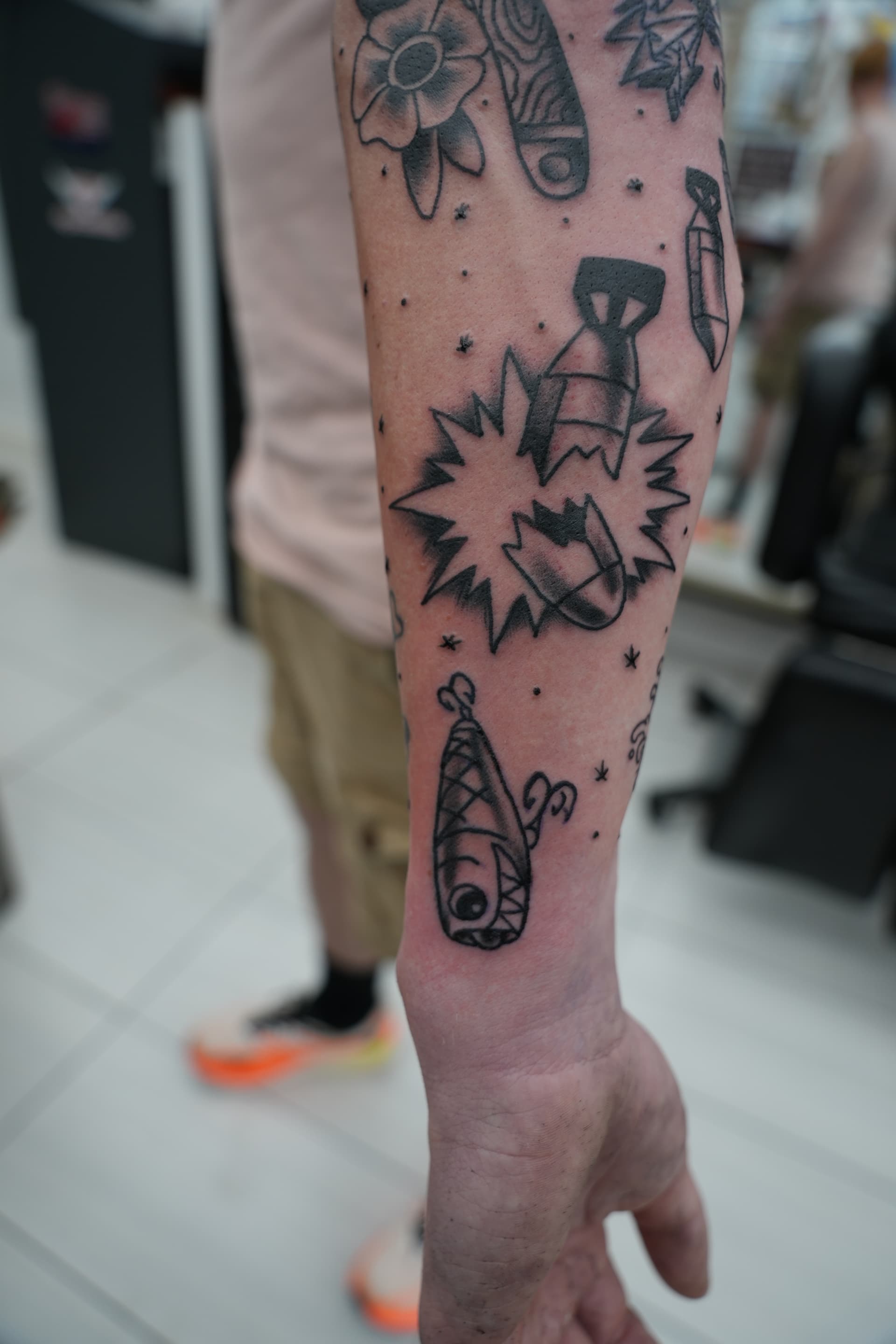 American traditional bomb fishing lure tattoo by Isaac Mackenzie