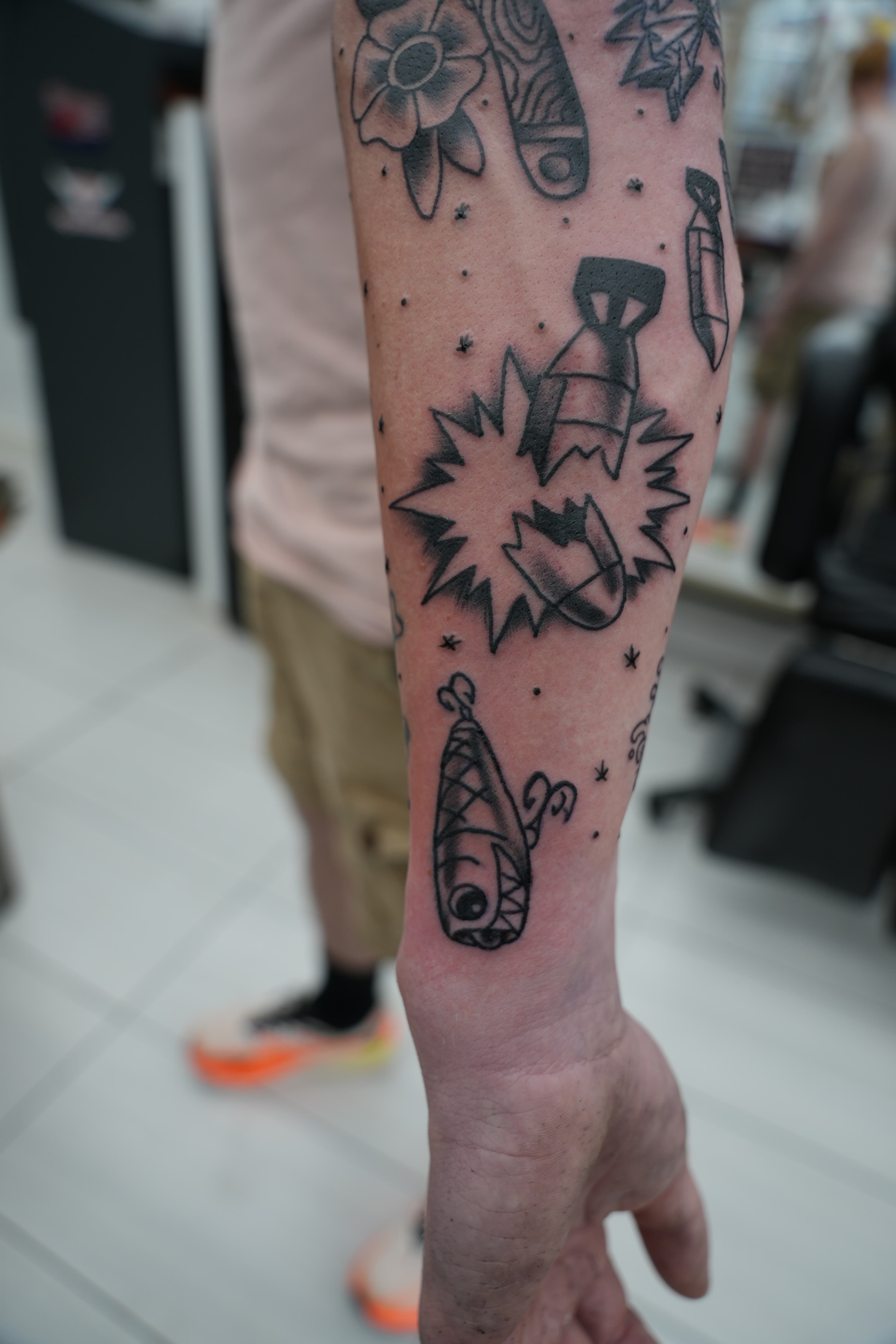 American traditional bomb fishing lure tattoo by Isaac Mackenzie