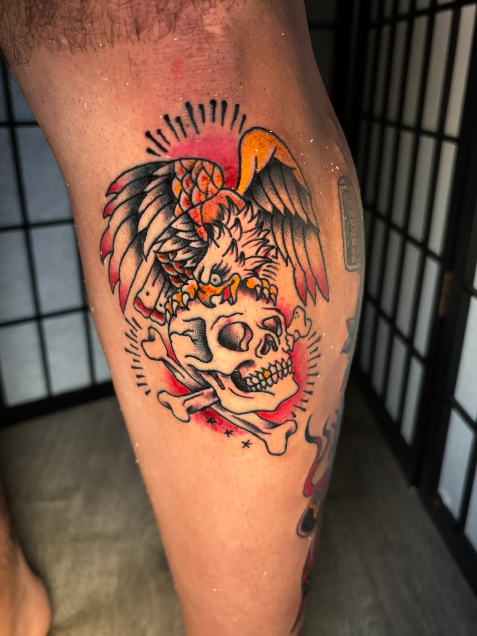American traditional eagle and skull flash by Isaac Mackenzie at TNT Tattoo, Aiea, Oahu