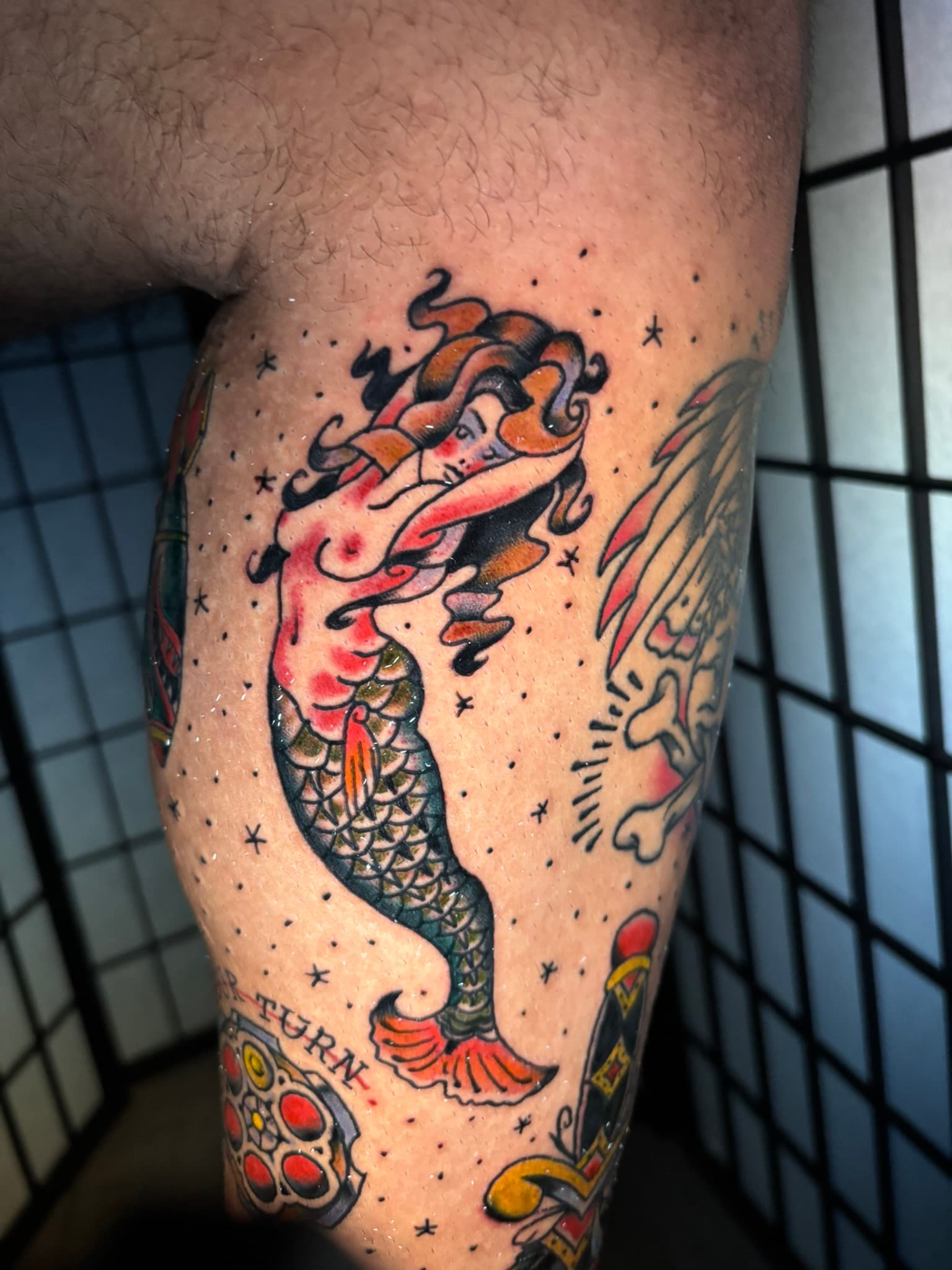 American traditional mermaid flash by Isaac Mackenzie at TNT Tattoo, Aiea, Oahu