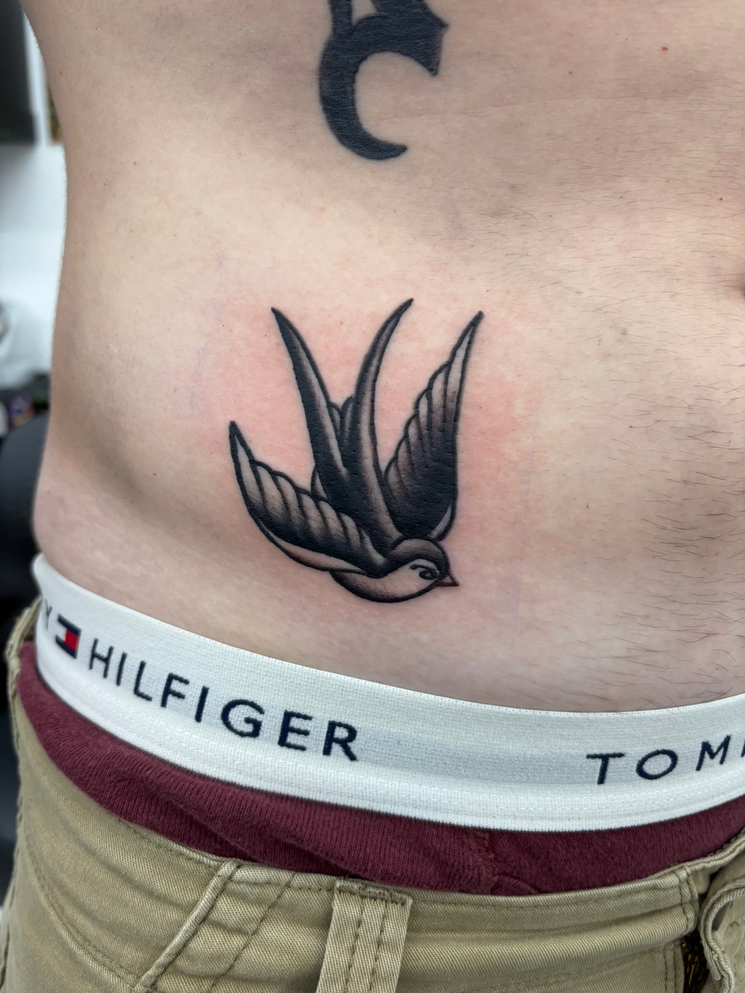 American traditional sparrow tattoo by Isaac Mackenzie, Oahu
