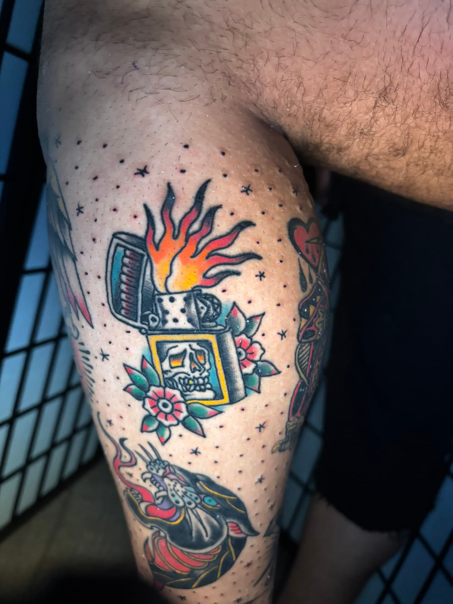 American traditional Zippo lighter skull flash by Isaac Mackenzie at TNT Tattoo, Aiea, Oahu