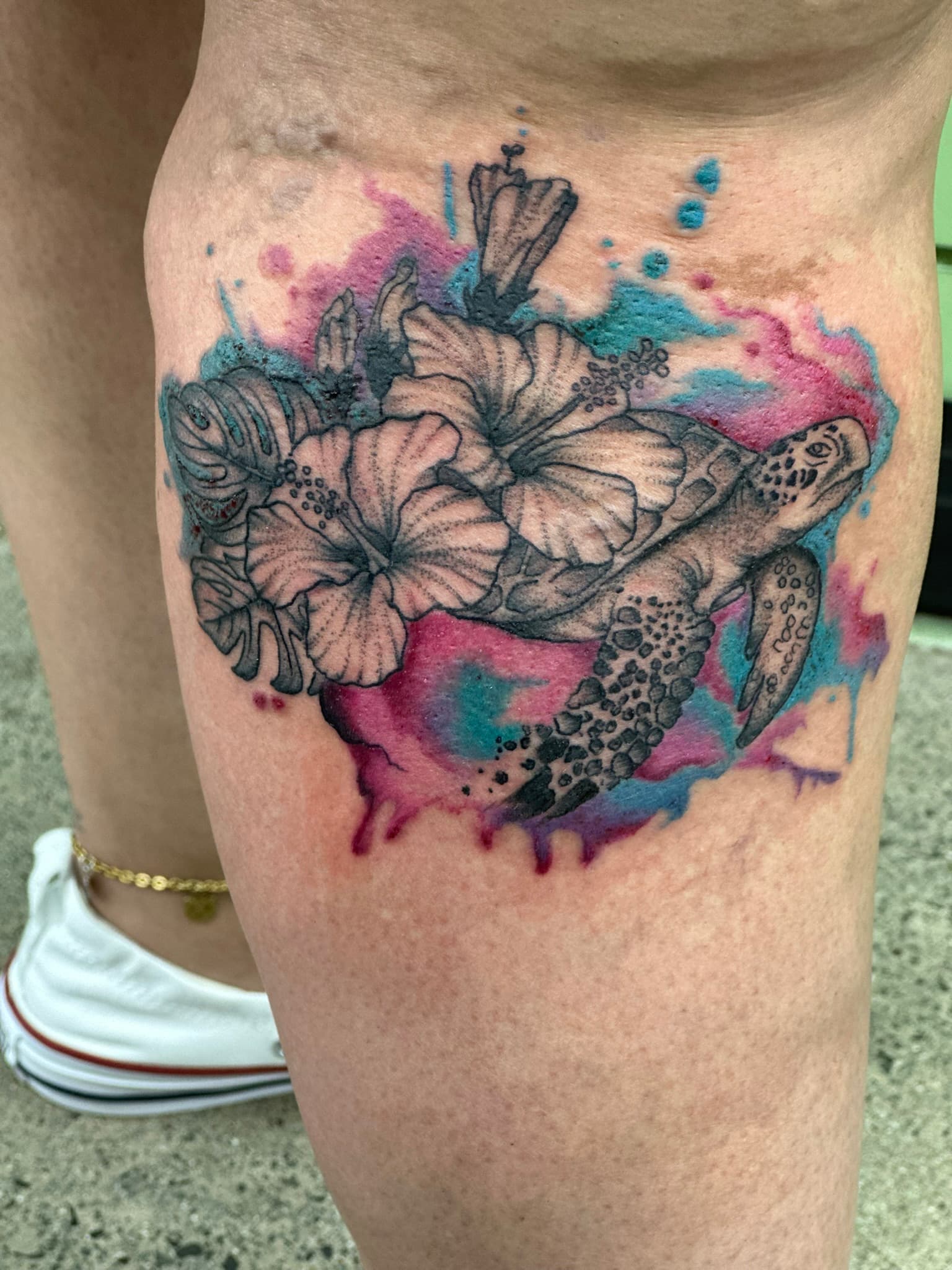 Watercolor hibiscus and sea turtle tattoo by Isaac Mackenzie, Hawaii