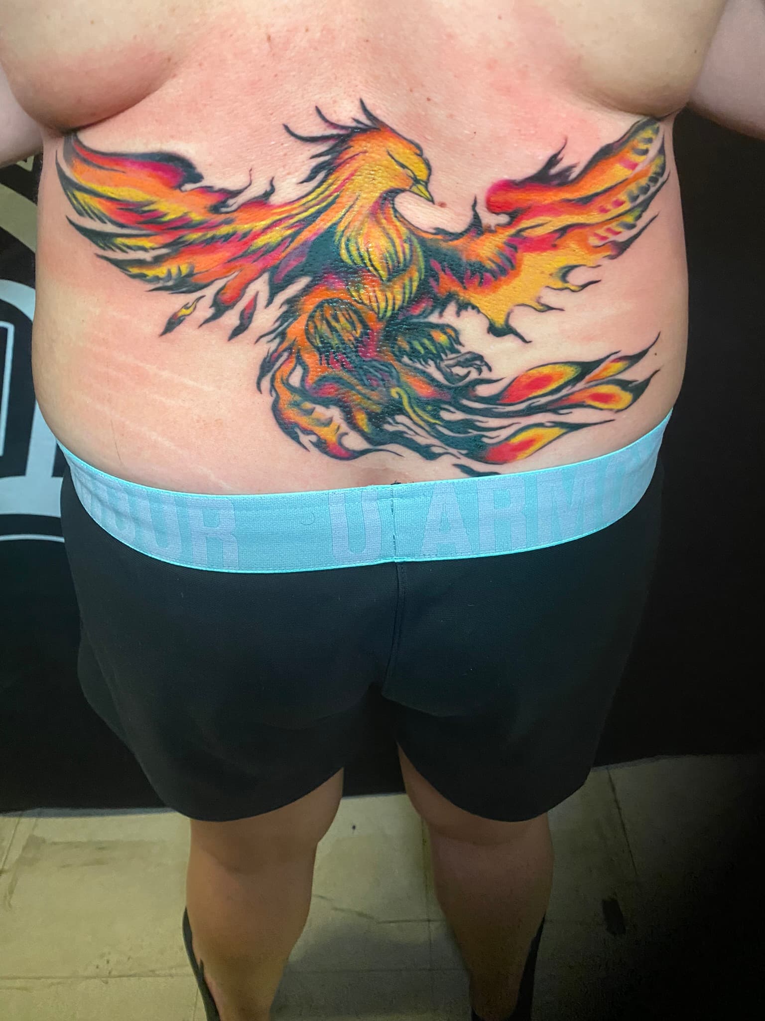 Watercolor phoenix tattoo by Isaac Mackenzie, Oahu