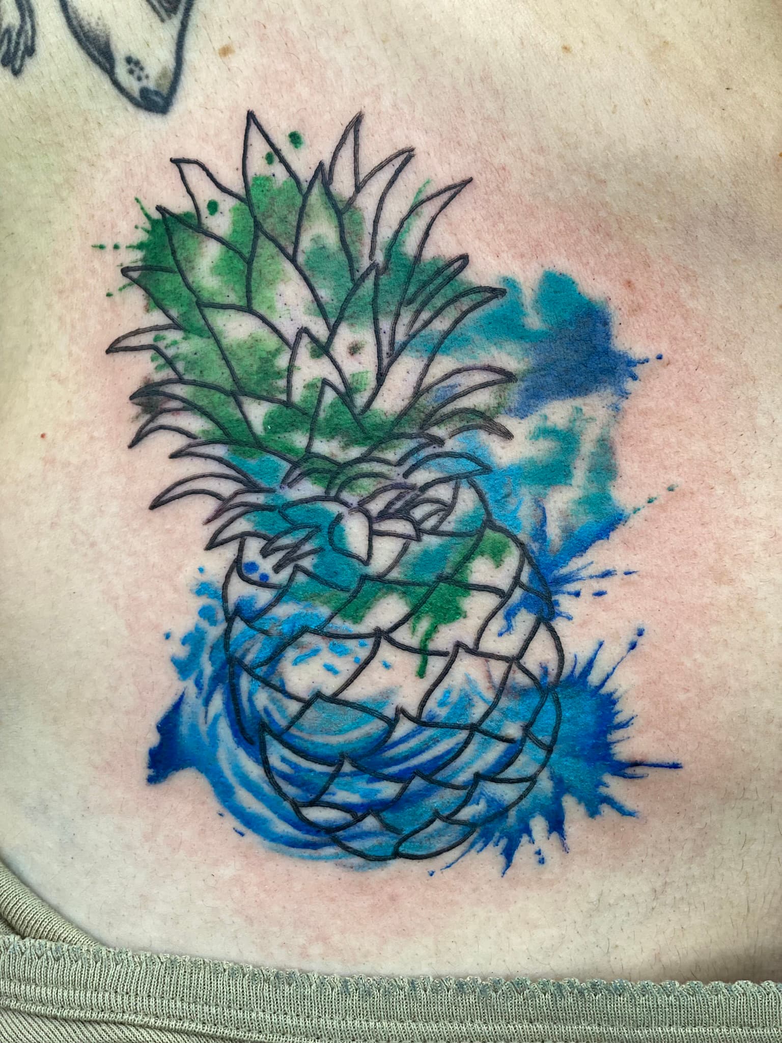 Watercolor pineapple tattoo by Isaac Mackenzie, Hawaii